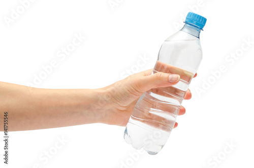 Fotografija hand of young girl holding water bottle