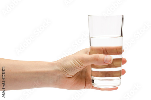 Fototapet hand of young girl holding water glass