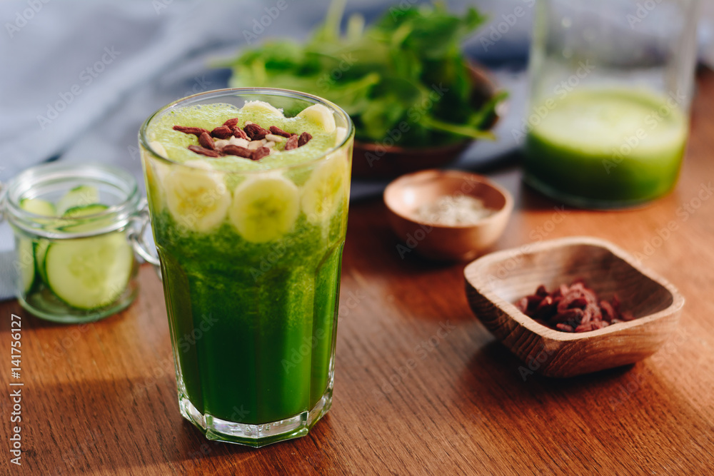 Green spinach smoothie with banana, cucumber, goji berries and sunflower seeds Green spinach smoothie with banana, cucumber, goji berries and sunflower seeds