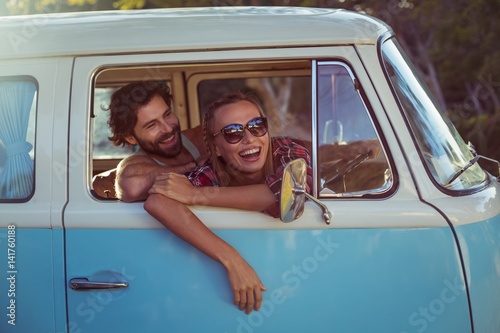 Couple sitting in a campervan