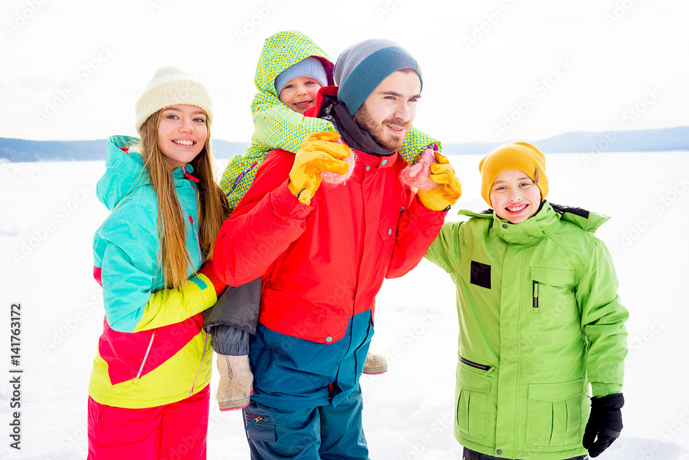 Family on a winter lake Family on a winter lake