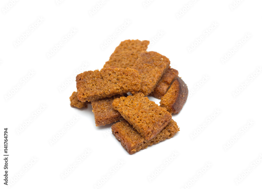Many small salty dried rusks isolated on white Many small salty dried rusks isolated on white