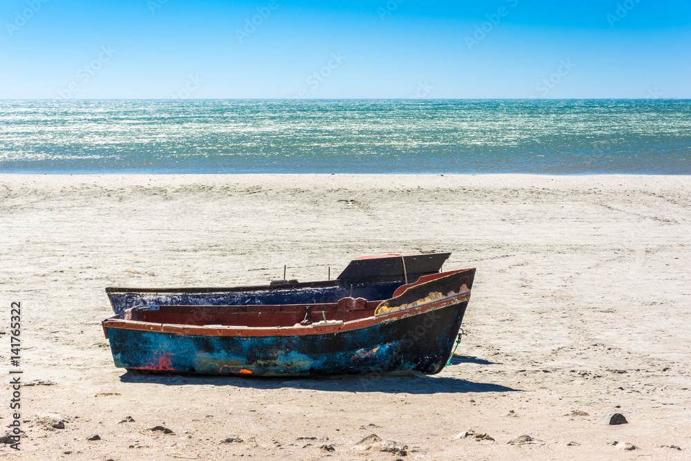 Little fishing boats on the beach in the western Cape, South Africa Little fishing boats on the beach in the western Cape, South Africa