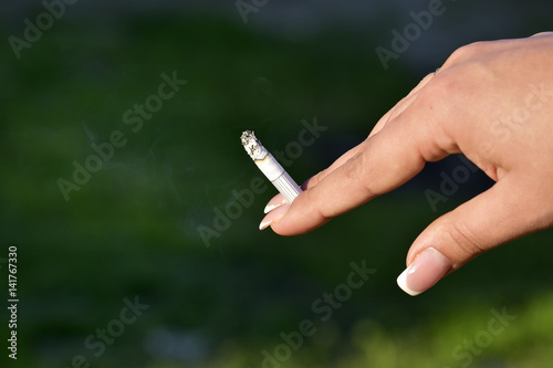cigarette in the hand.