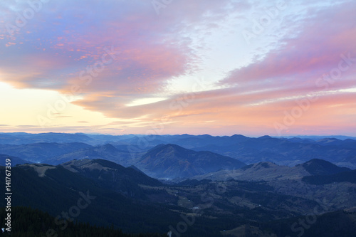 Majestic sunset in the mountains landscape. Dramatic sky. Carpathian, Romania, Europe.
