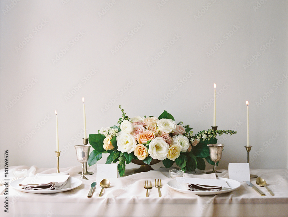 Wedding table setting with flowers and candles Stock Photo | Adobe Stock