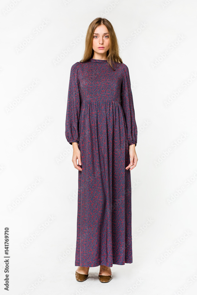 Young elegant female in light summer dress, over white background Young elegant female in light summer dress, over white background