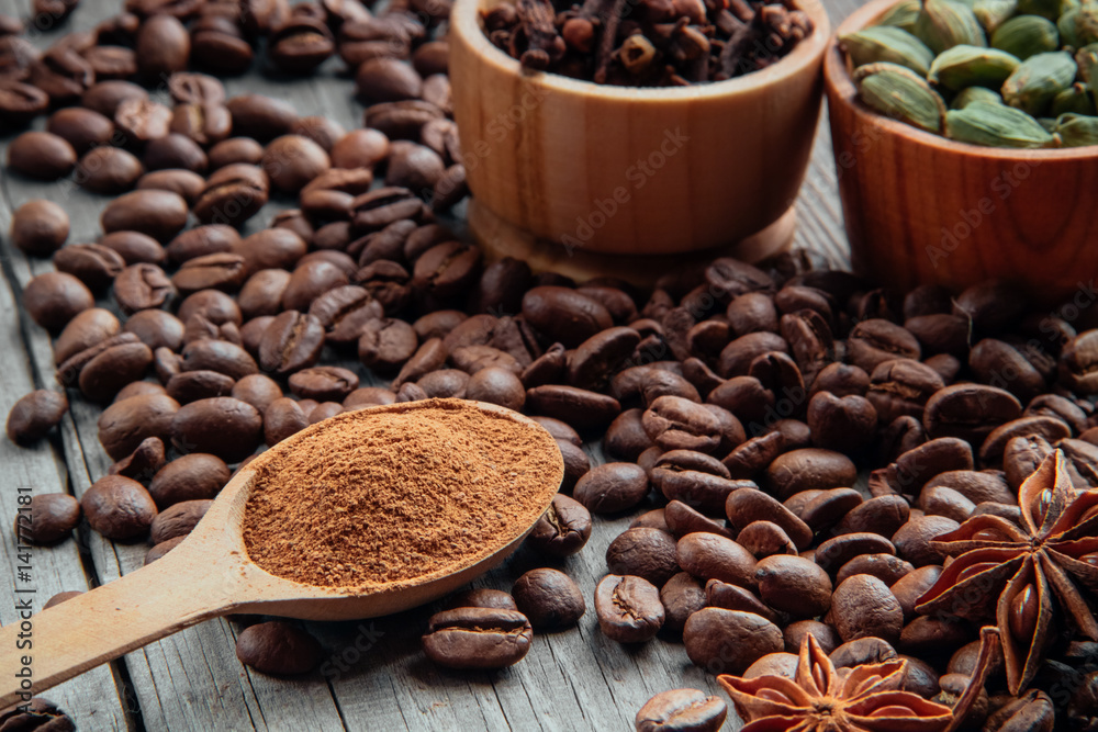 Coffee beans on a wooden background close-up Coffee beans on a wooden background close-up