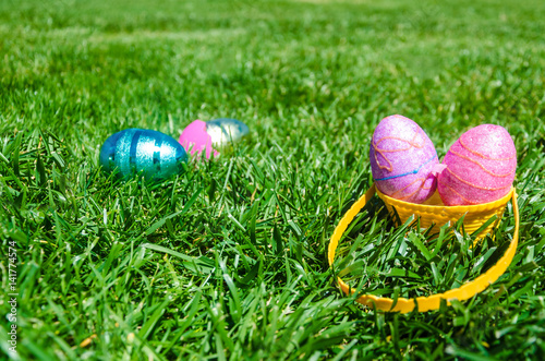 Easter eggs on the grass background photo