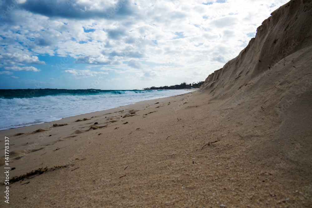 Rock & sand wall on the beach near the ocean. New Providence, Nassau, Bahamas. Rock & sand wall on the beach near the ocean. New Providence, Nassau, Bahamas.