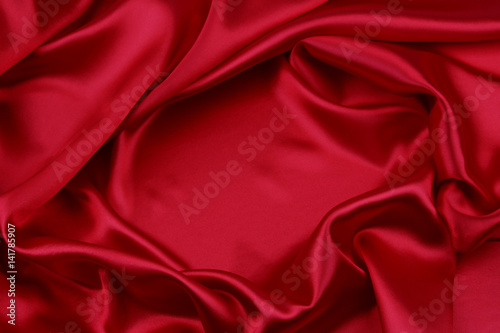 Rippled red silk fabric sheet texture