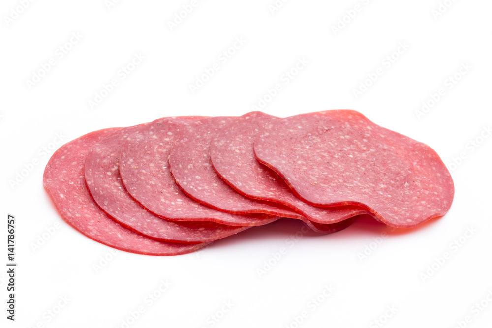 Salami smoked sausage one slice isolated on white background cutout. Salami smoked sausage one slice isolated on white background cutout.