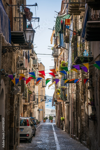 Narrow italian street in Cefalu town  © Ernest Karapetau