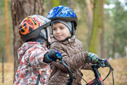 Young people riding bikes photo