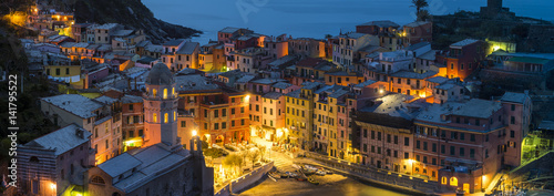 Vernazza, Cinque Terre, La Spezia, Liguria, Italy. Panoramic view of the village at dusk.