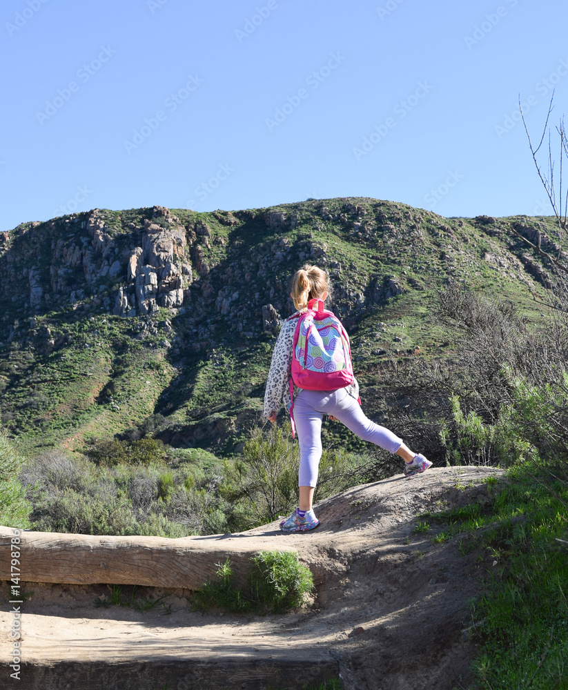 A girl hiking at Mission Trails Regional Park in San Diego, California.