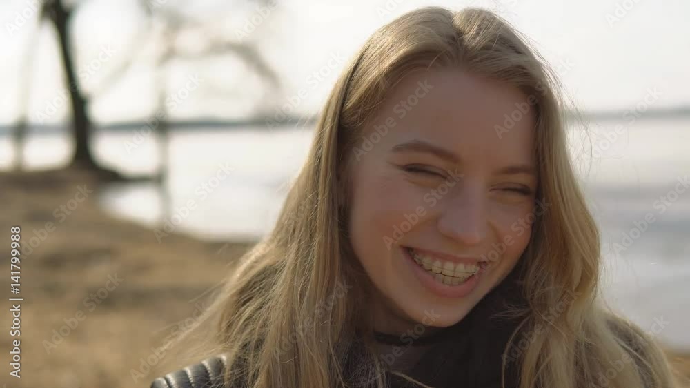 Beautiful girl wearing braces, candid portrait Beautiful girl wearing braces, candid portrait