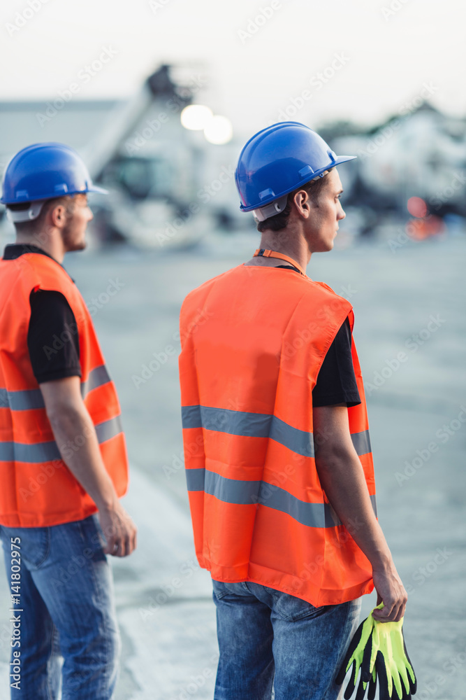 Construction workers on construction site Construction workers on construction site