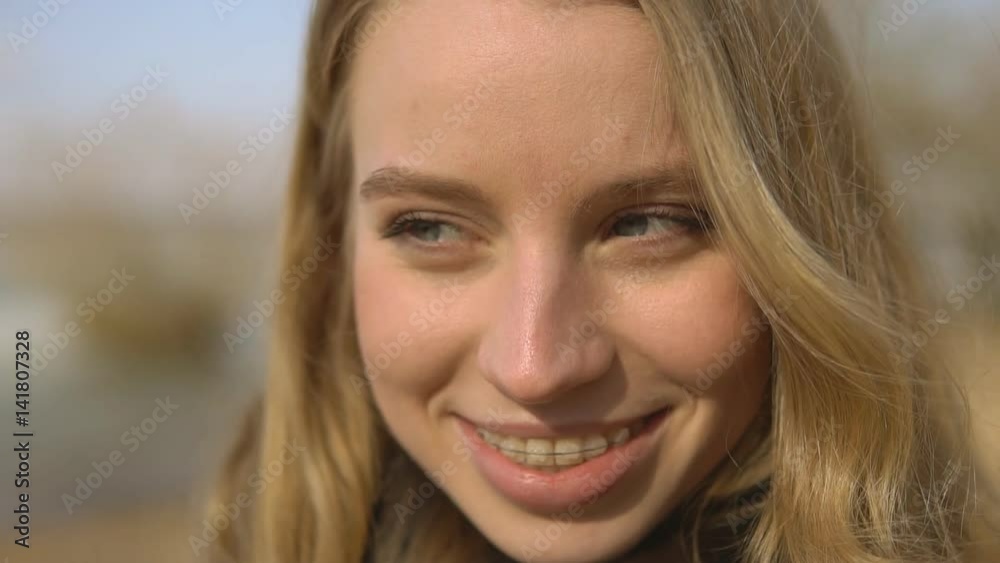 Beautiful girl wearing braces, candid portrait Beautiful girl wearing braces, candid portrait