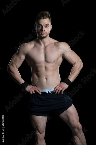 Portrait Of A Bodybuilder Isolate on Black Blackground © Jale Ibrak