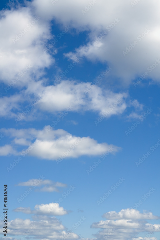 White clouds flying against blue sky. White clouds flying against blue sky.