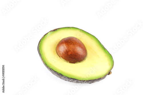 fresh cut avocado in half isolated on white background