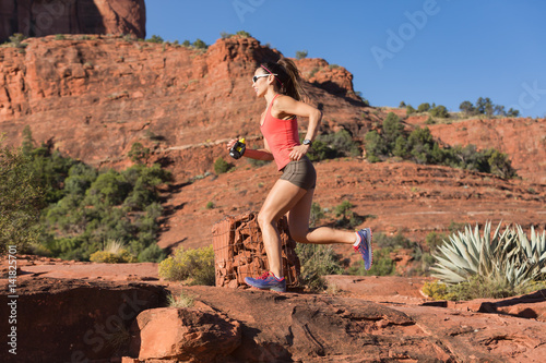 Woman Trail Running Uphill