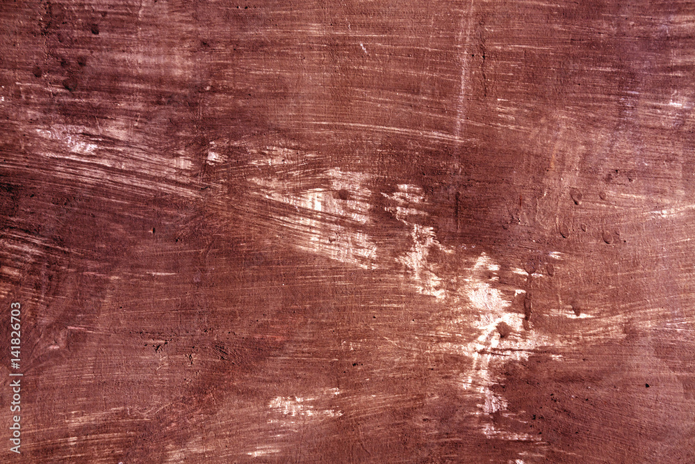 Obraz premium Weathered red cament wall surface.