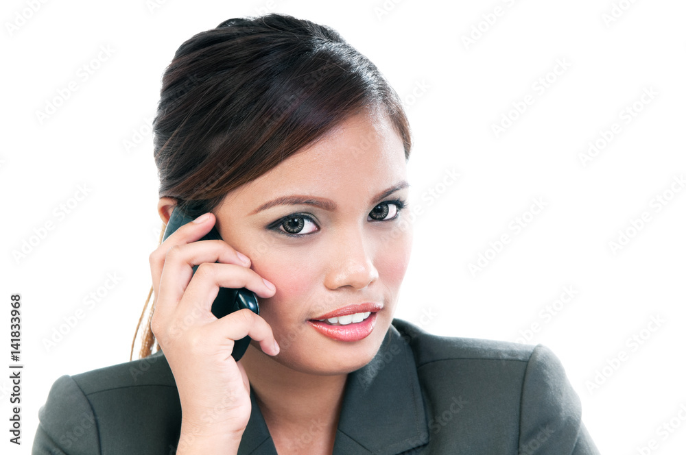 Portrait of a young woman using mobile phone over white background Portrait of a young woman using mobile phone over white background