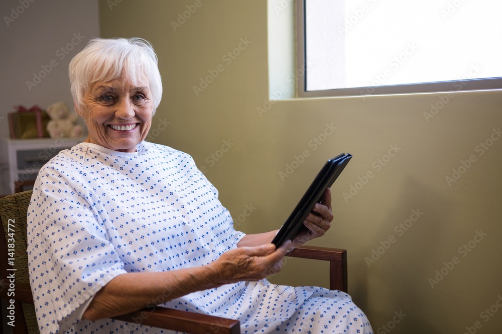 Senior patient holding digital tablet Senior patient holding digital tablet