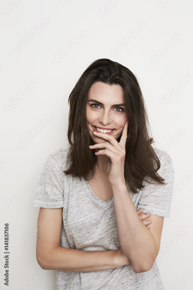 Gorgeous brunette girl smiling ins studio Gorgeous brunette girl smiling ins studio