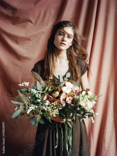 wonderful bride with wedding bouquet