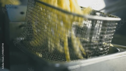 Wallpaper Mural French fries in the deep fryer close-up Torontodigital.ca