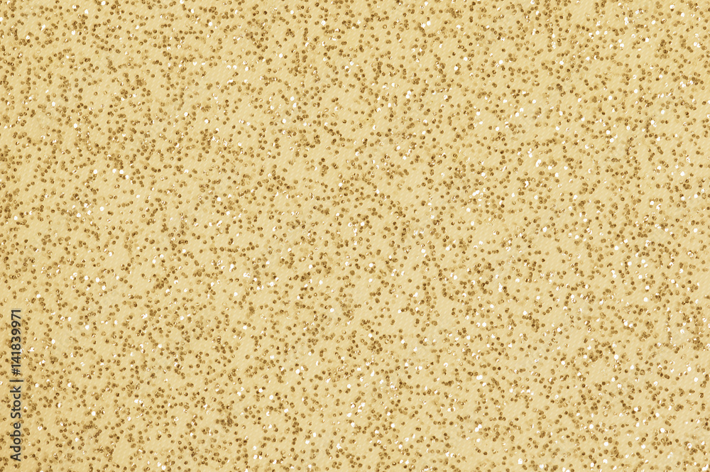 Golden color glitter textured background Golden color glitter textured background