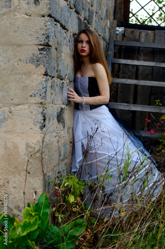 beautiful girl in dress at home