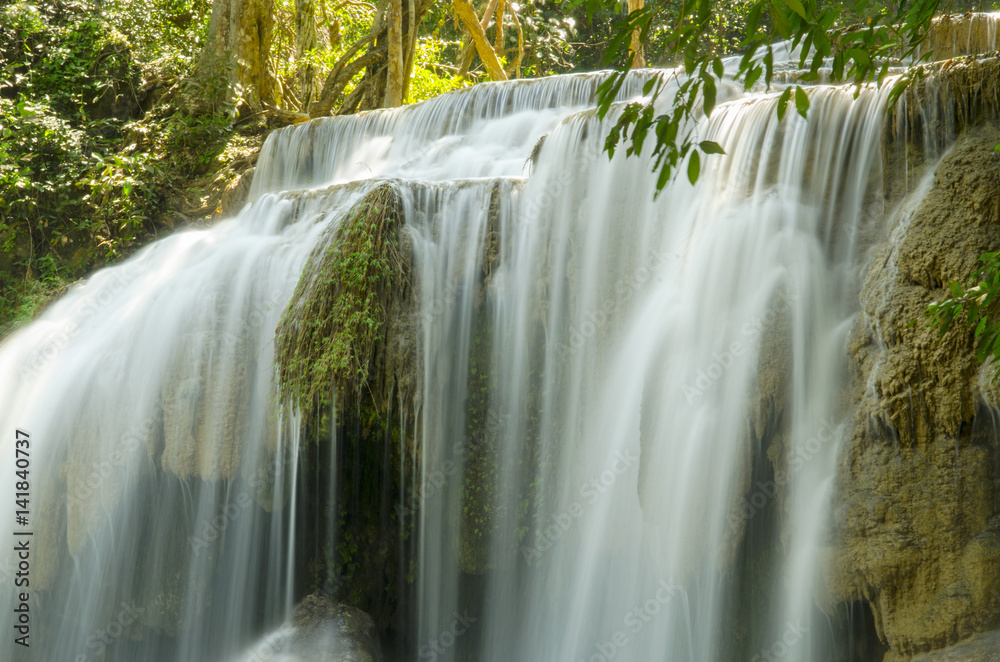 Naklejka premium Deep forest waterfall at Erawan waterfall National Park Kanjanaburi Thailand