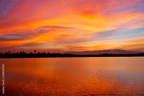  view from water of the sunrise full of colors