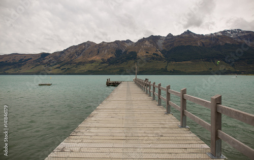 Wooden jetty at the mountain lake, South Island, New Zealand 