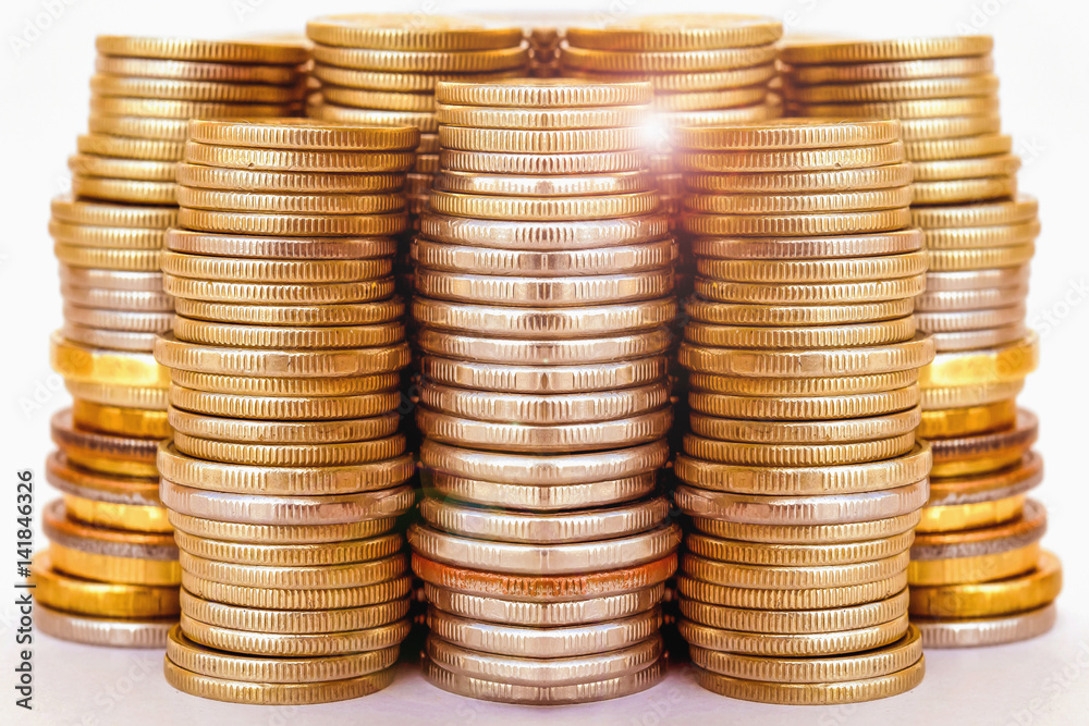 Coins stacked in bars. The concept of revenue growth Coins stacked in bars. The concept of revenue growth
