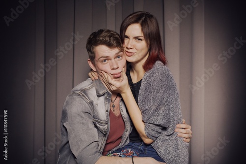 Happy couple in love in a photo booth