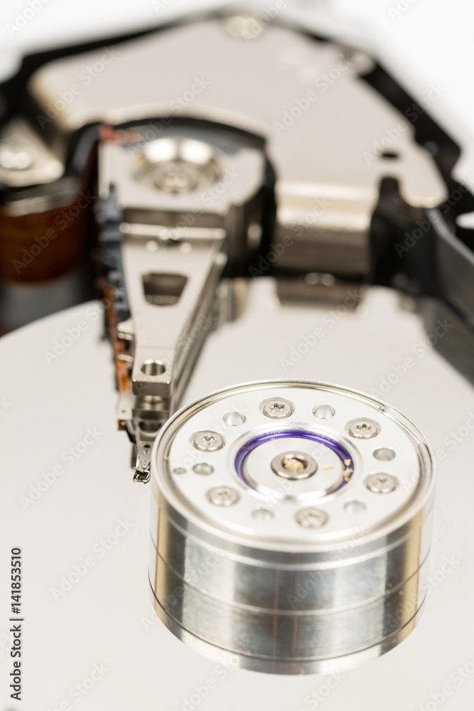 Inside opened pc hard disc isolated over white background