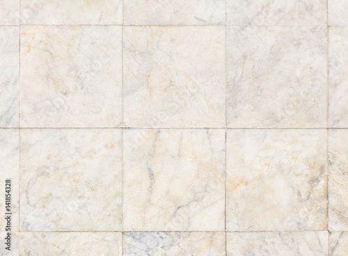Real marble floor tile in top view with beige abstract texture pattern of natural material i.e. stone, rock. Smooth surface for decorative wall, floor of interior building i.e. bathroom, kitchen.
