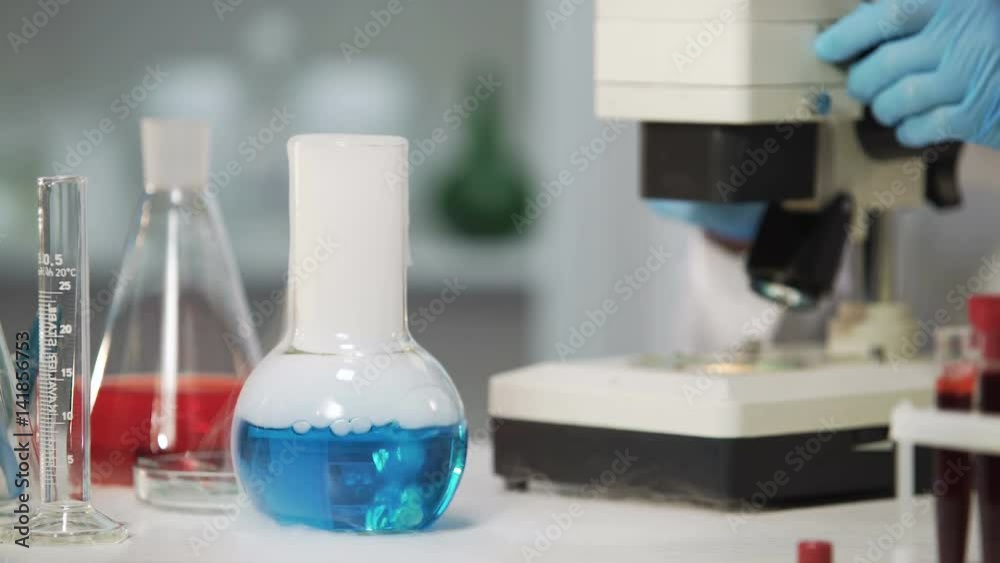 Biochemical experiment, liquid substance evaporating in Erlenmeyer flask