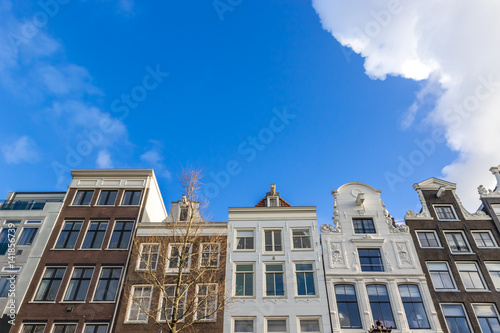 Old buildings in Amsterdam in sunny day