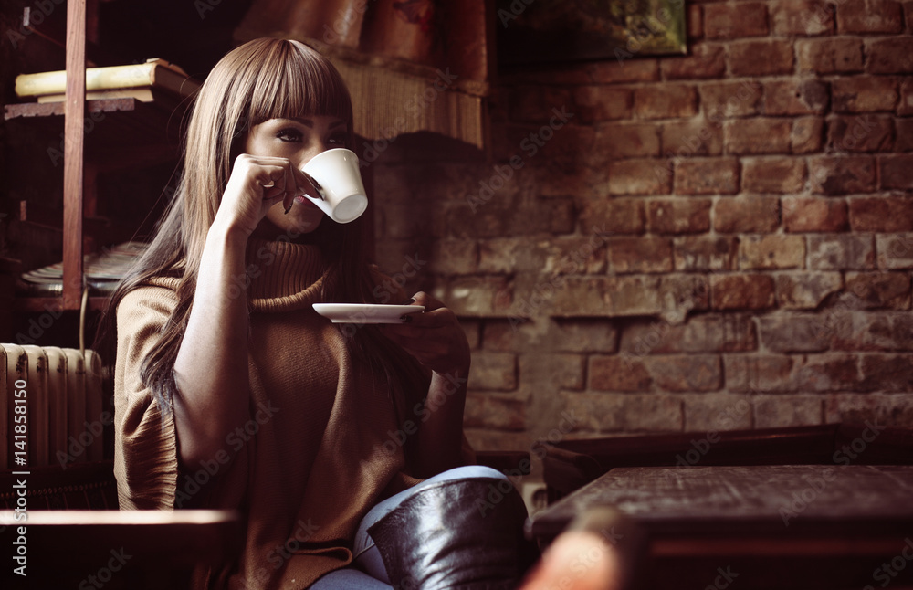 Obraz premium Woman enjoying in coffee.