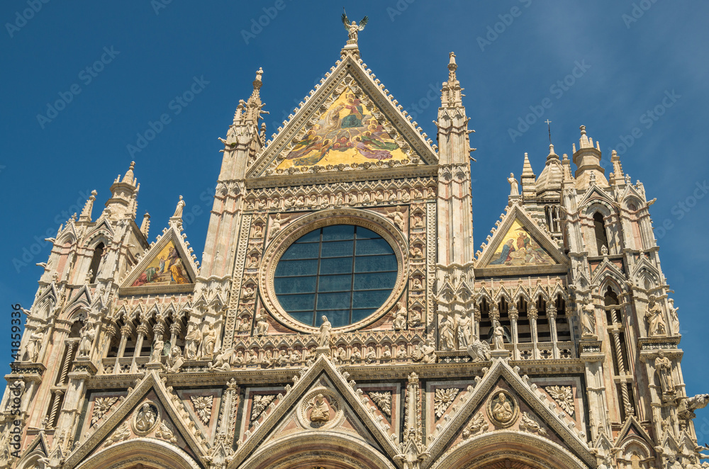 Siena Cathedral is a medieval structure completed in the 13 century and is currently dedicated to the Assumption of  Mary