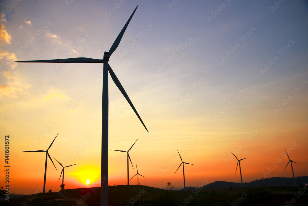 Stock Photo - Wind power at sunset Stock Photo - Wind power at sunset