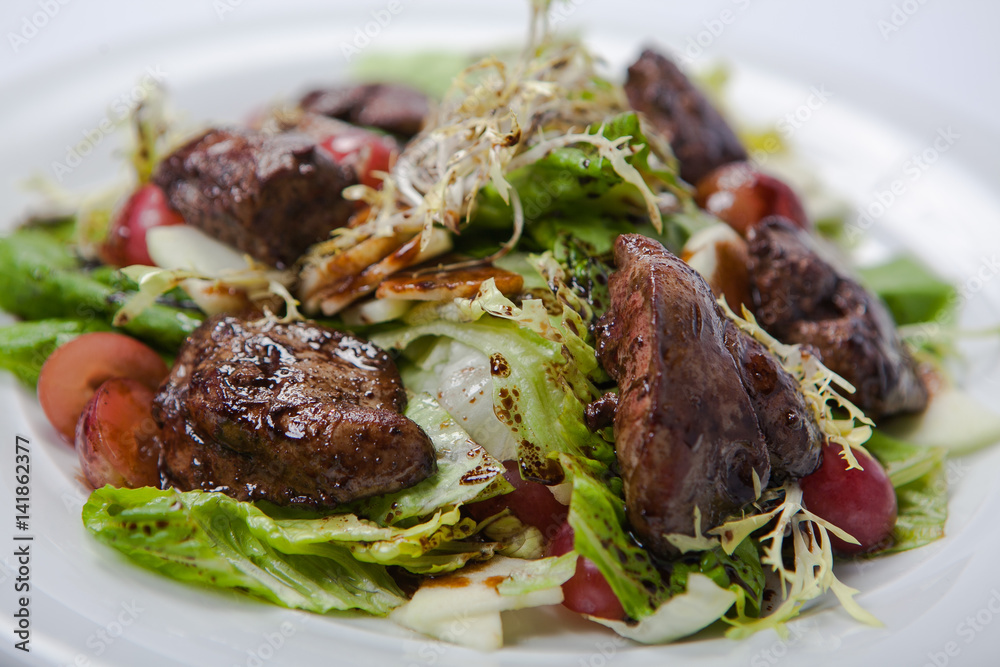 warm salad with chicken liver and grapes