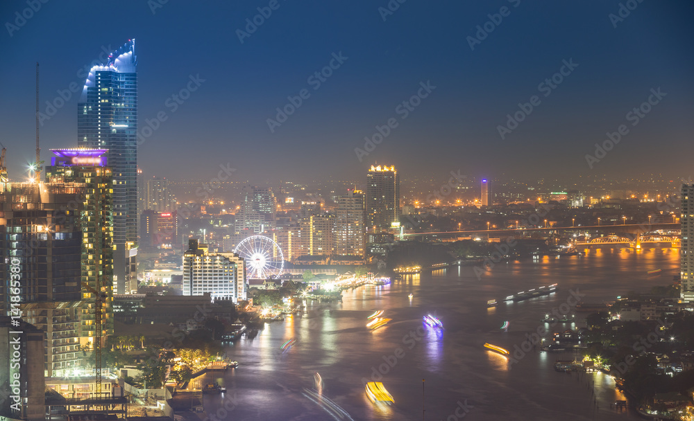 Fototapeta premium Aerial view cityscape and Chaophraya river in Bangkok, Thailand.