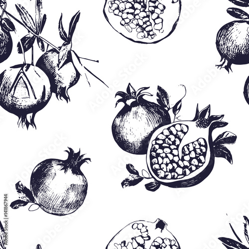 Seamless pattern with pomegranates. Fruit on white background.